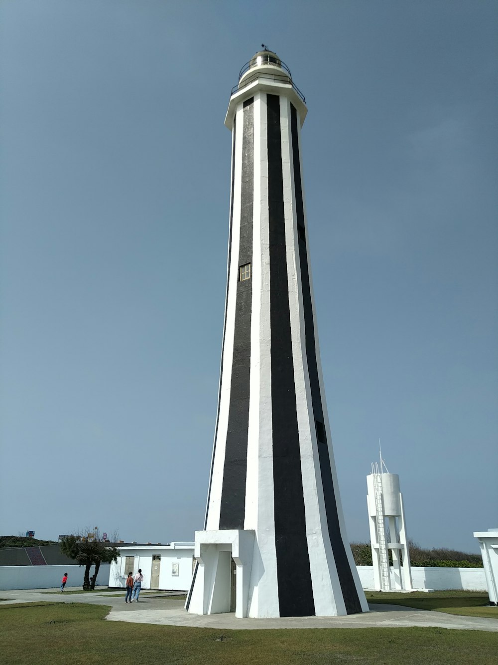 a tall tower with a clock on top of it