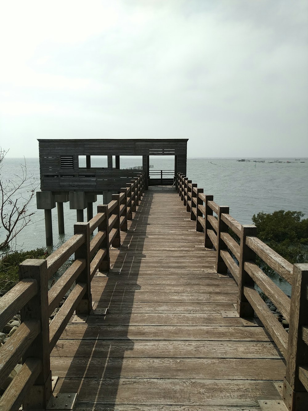 a wooden bridge over a body of water