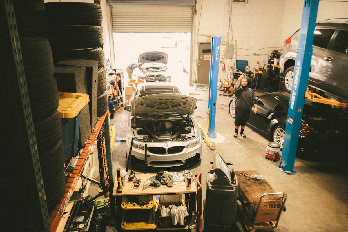 Vehicle being serviced inside a repair garage