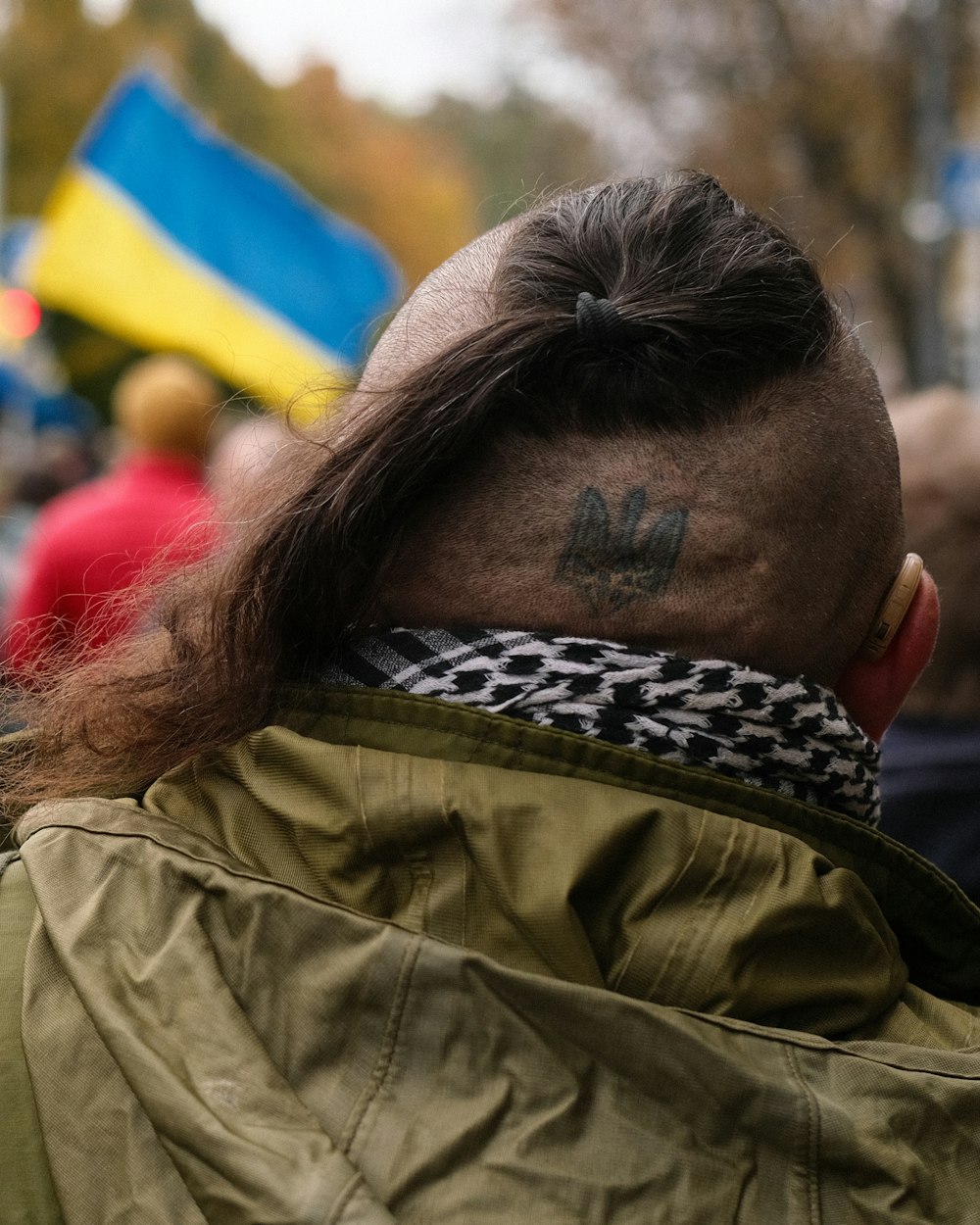 a woman with a tattoo on her head