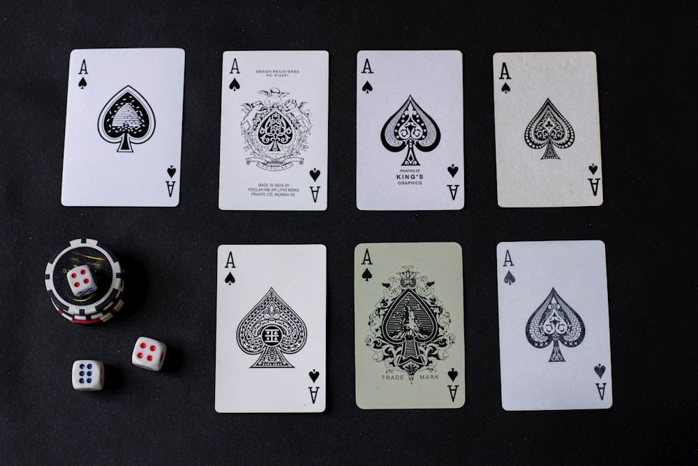 playing cards and dice on a table