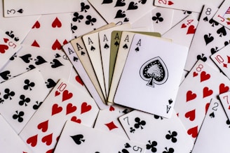 a pile of playing cards sitting on top of each other