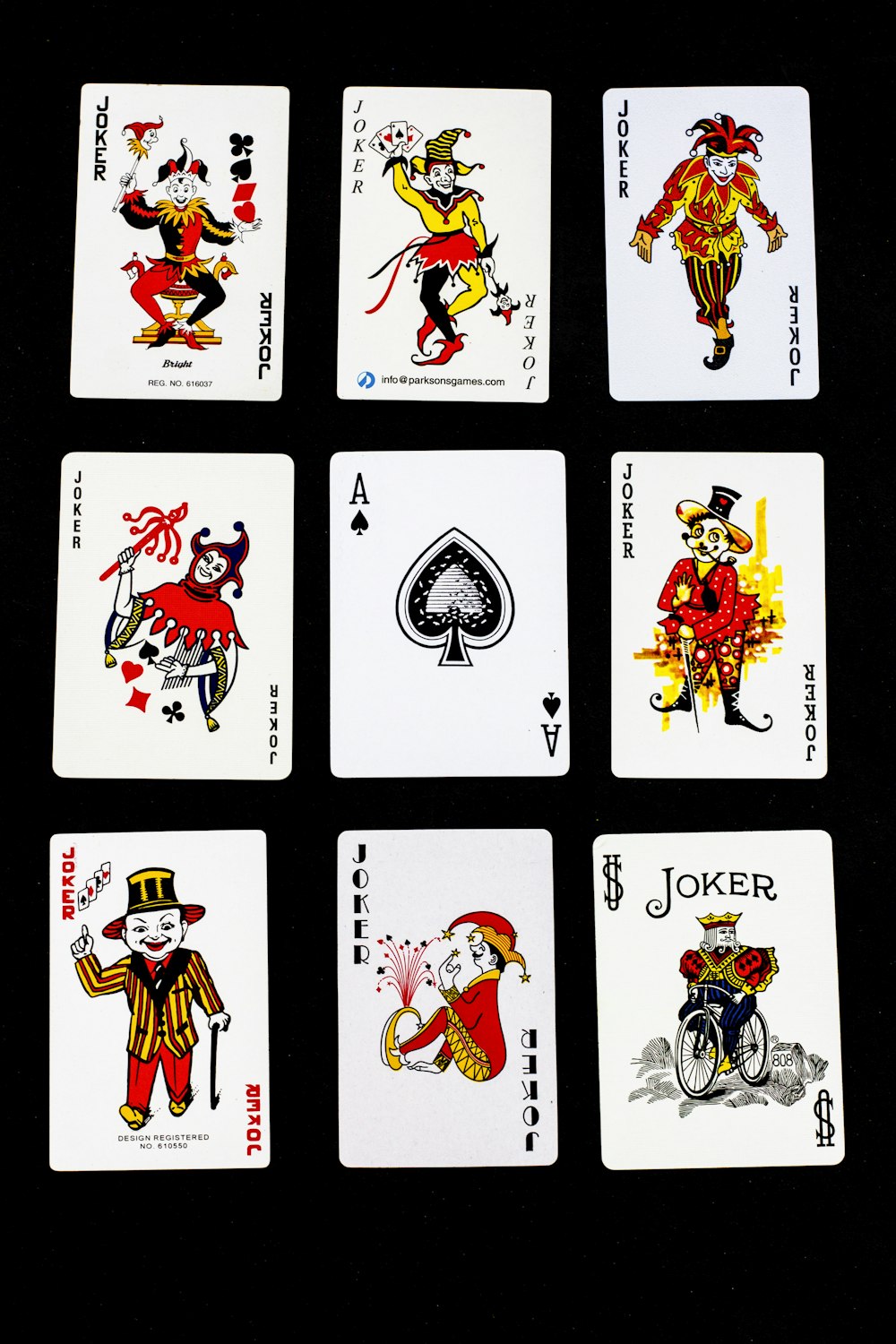 a set of six playing cards with different designs