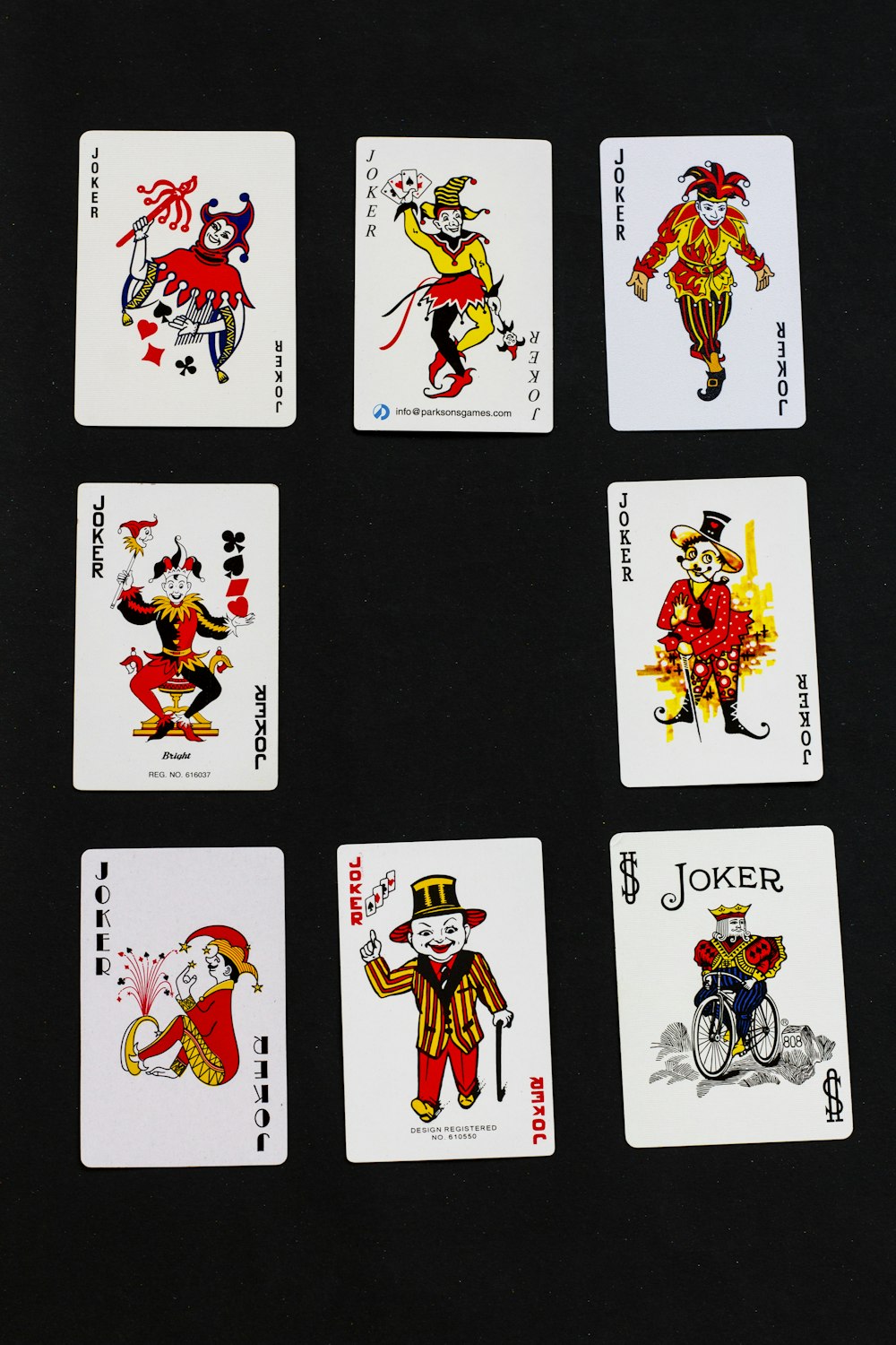 a set of six playing cards with different designs