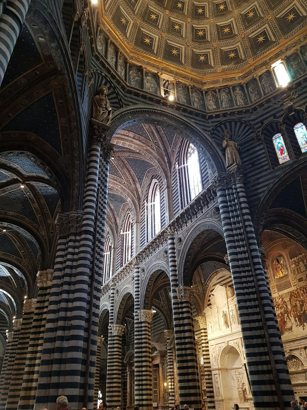 a large cathedral with many columns and arches