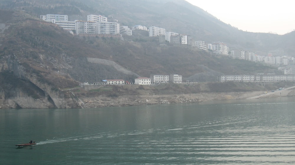 a person in a boat on a body of water