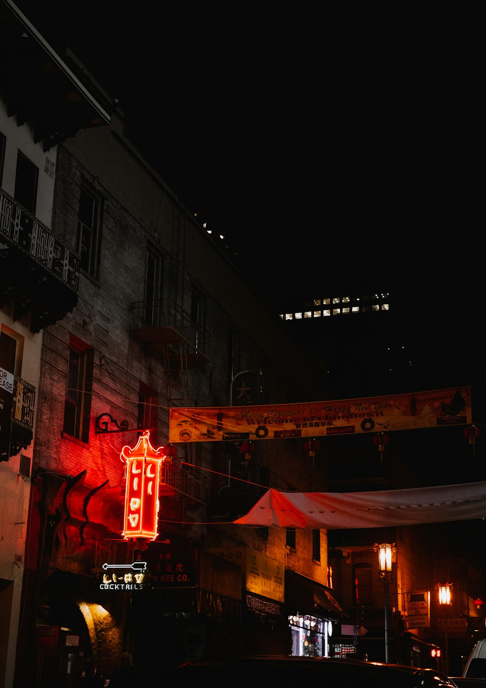 a neon sign on the side of a building