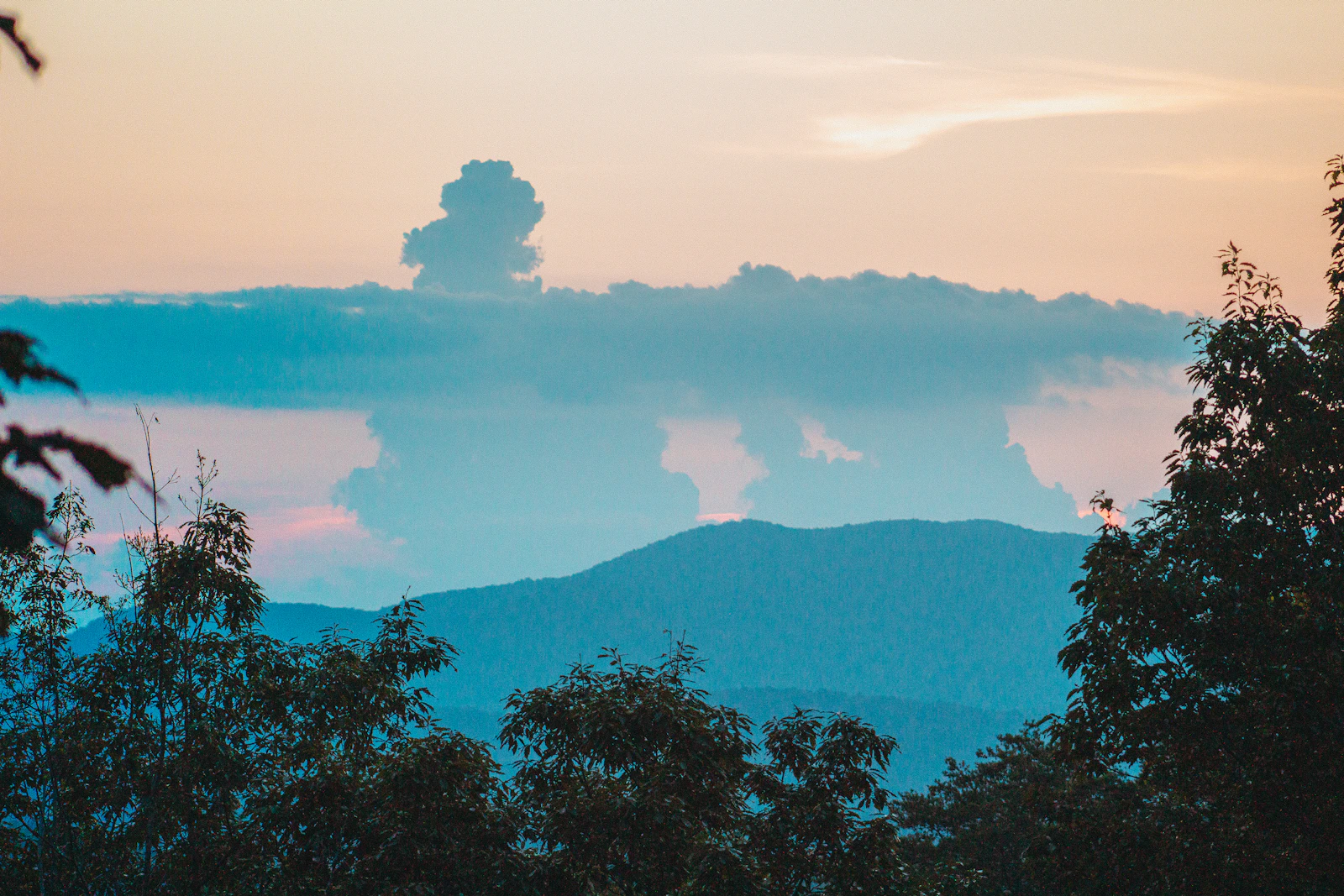 Blue Ridge mountains in North Georgia beneath a soft sunset sky