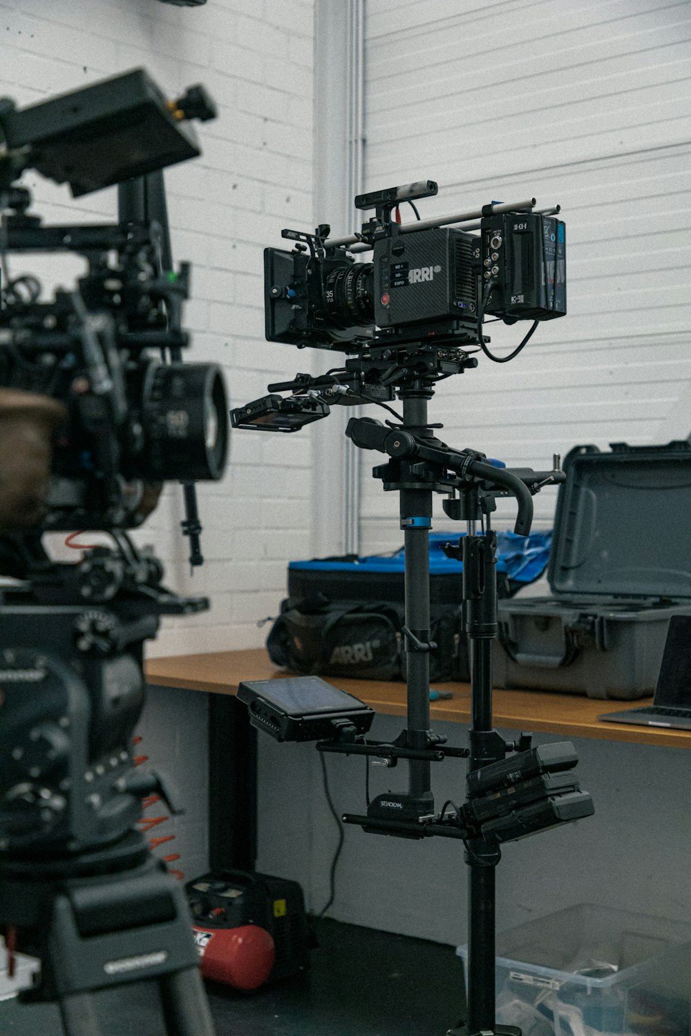 a camera set up on a table in a room