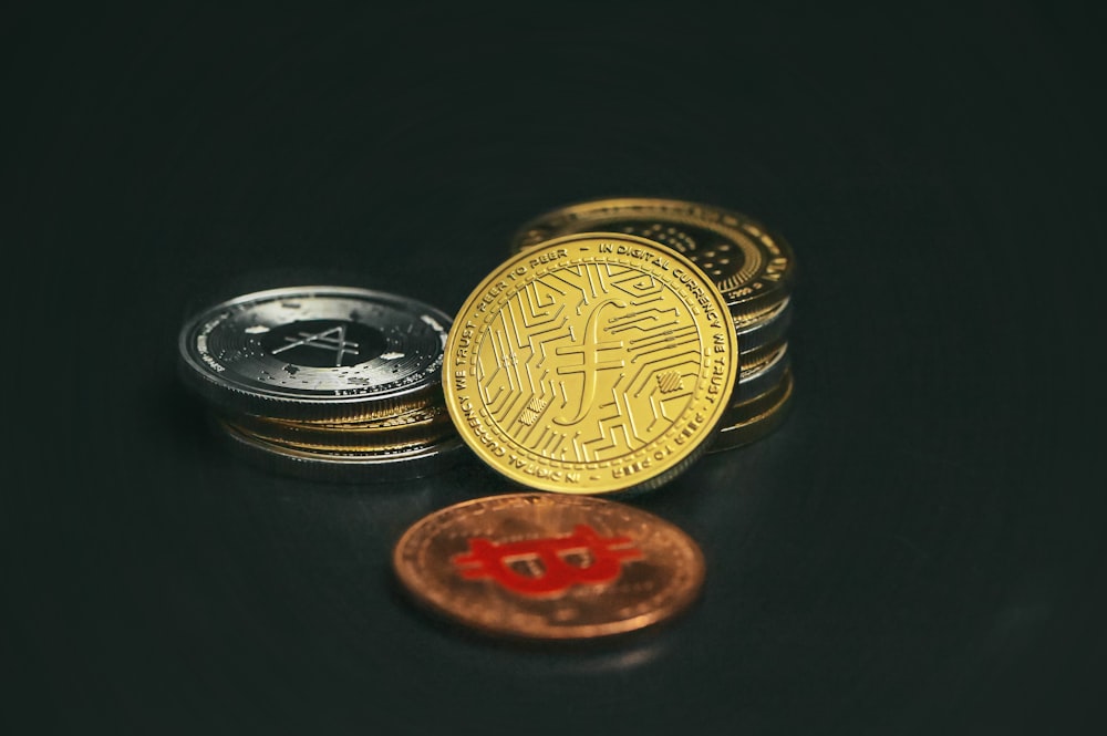 a pile of coins sitting on top of a table