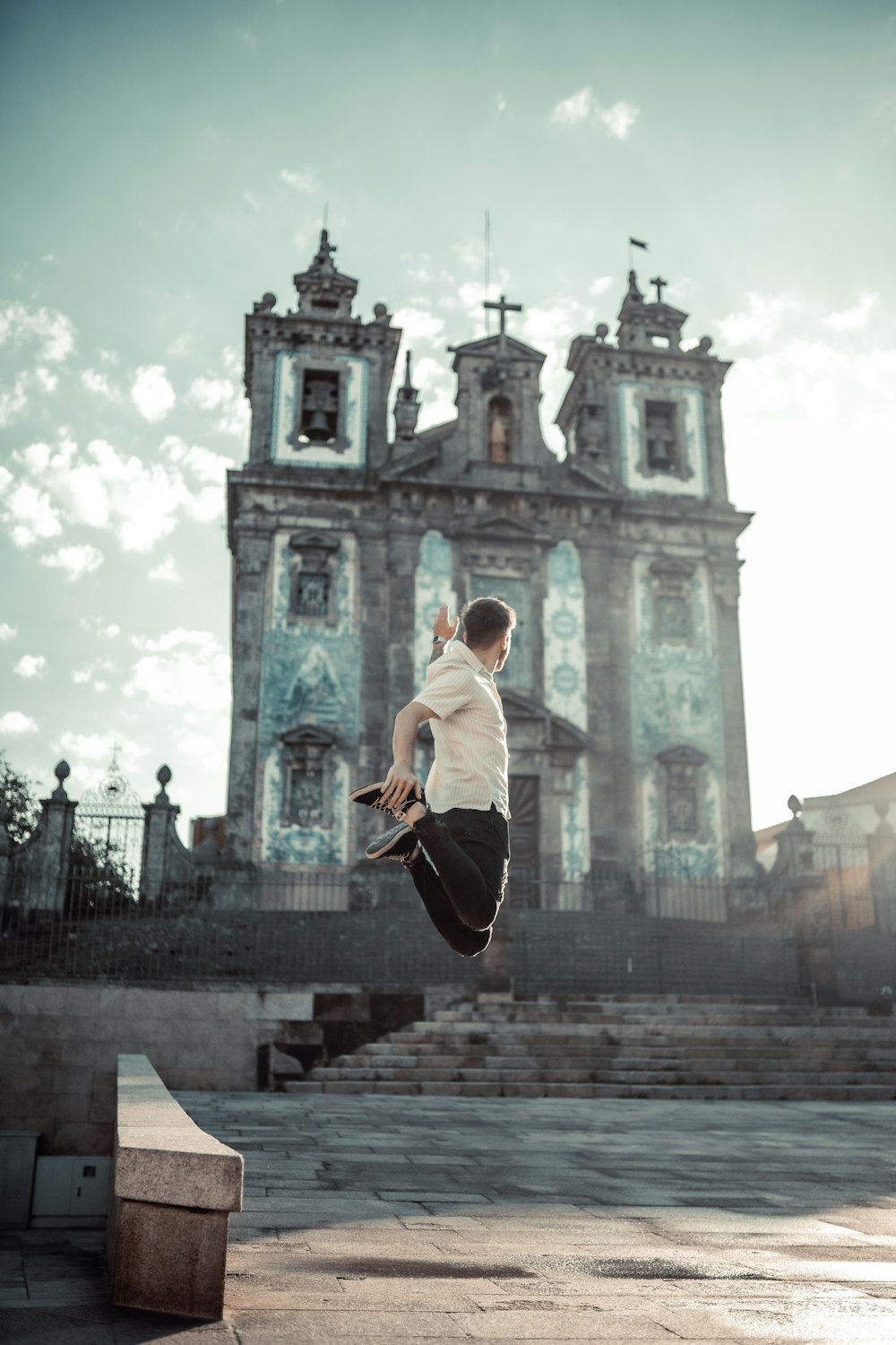 a person jumping in the air on a skateboard