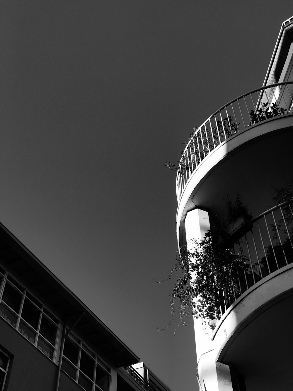 a black and white photo of a tall building