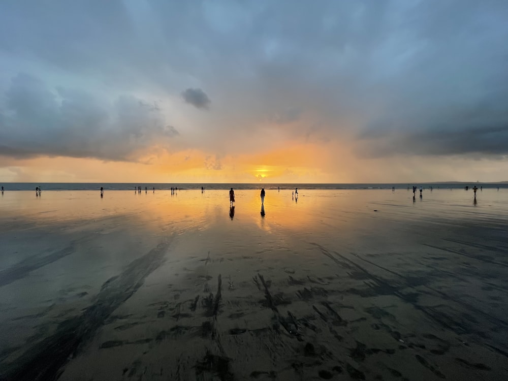 a large body of water under a cloudy sky