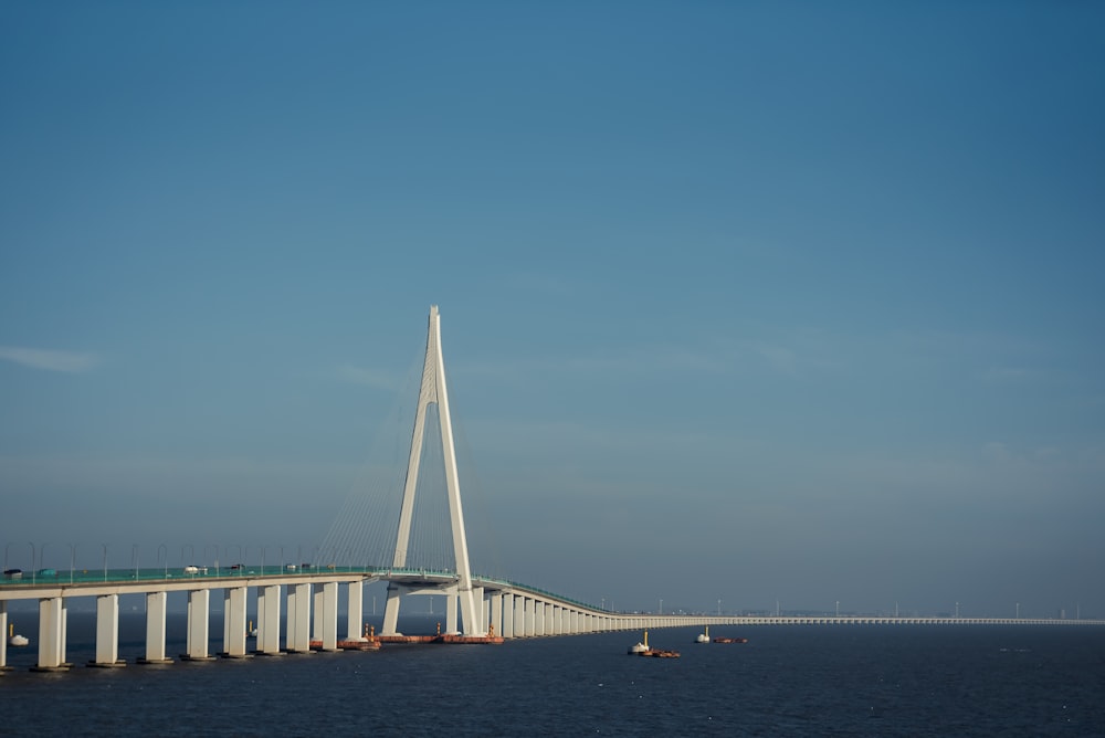 a large bridge spanning over a large body of water