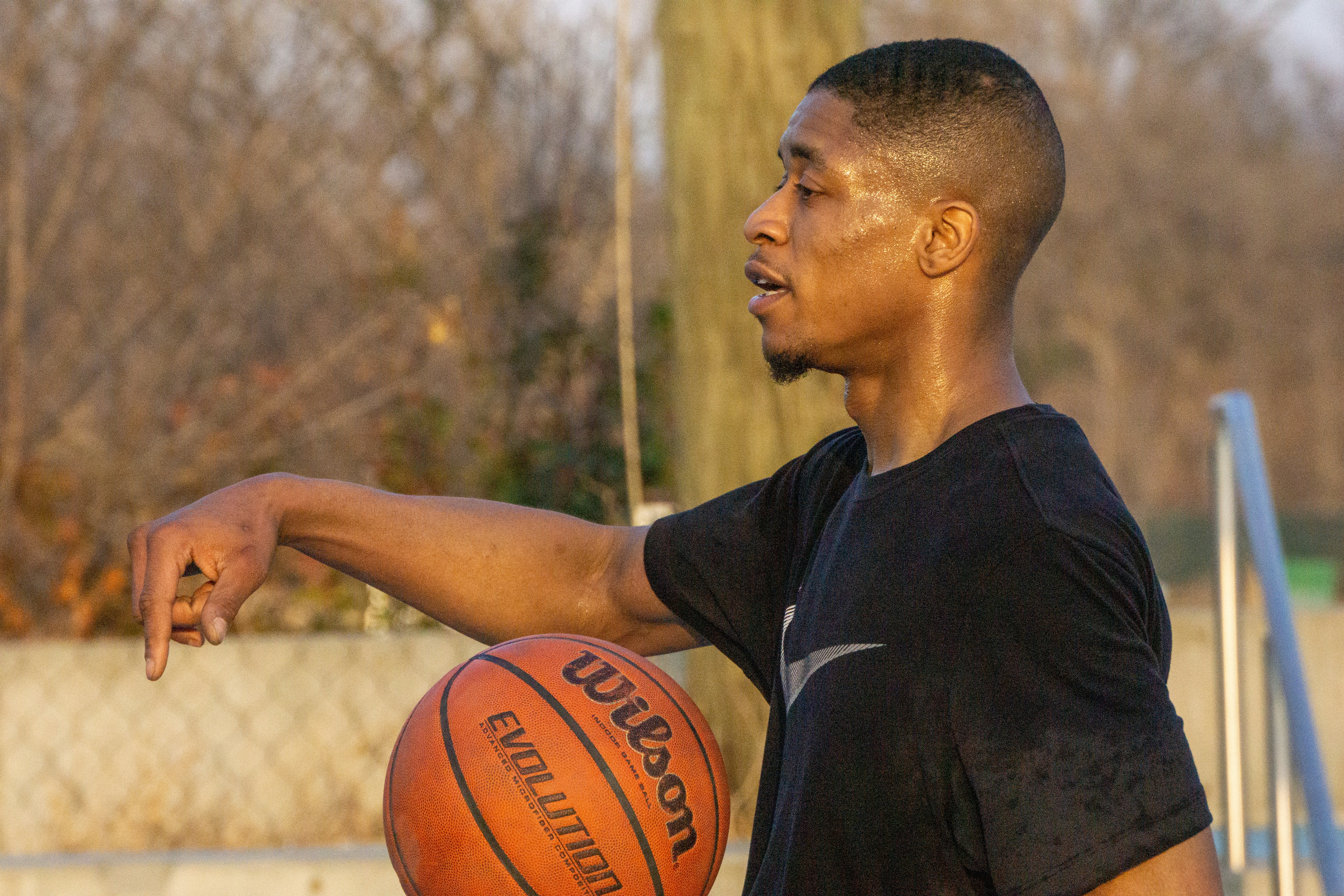 Basketball trainer on the court