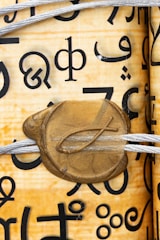 A close-up of handwritten scrolls with coded messages from the society archives.