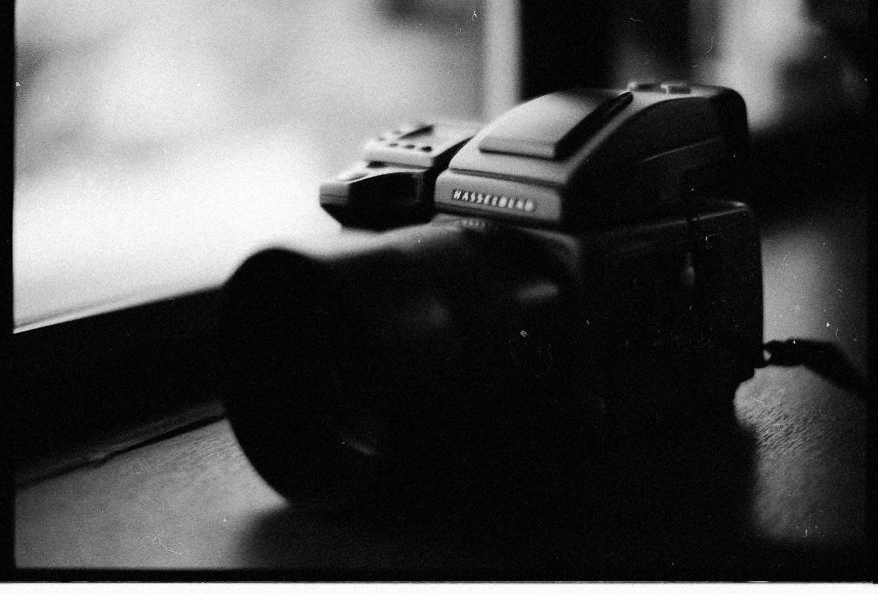 a black and white photo of a camera