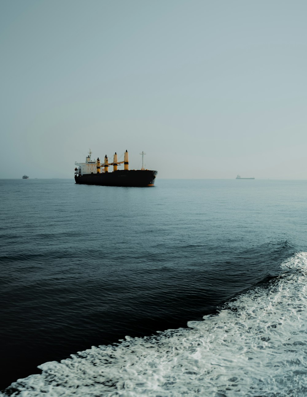 a large ship sailing across a large body of water