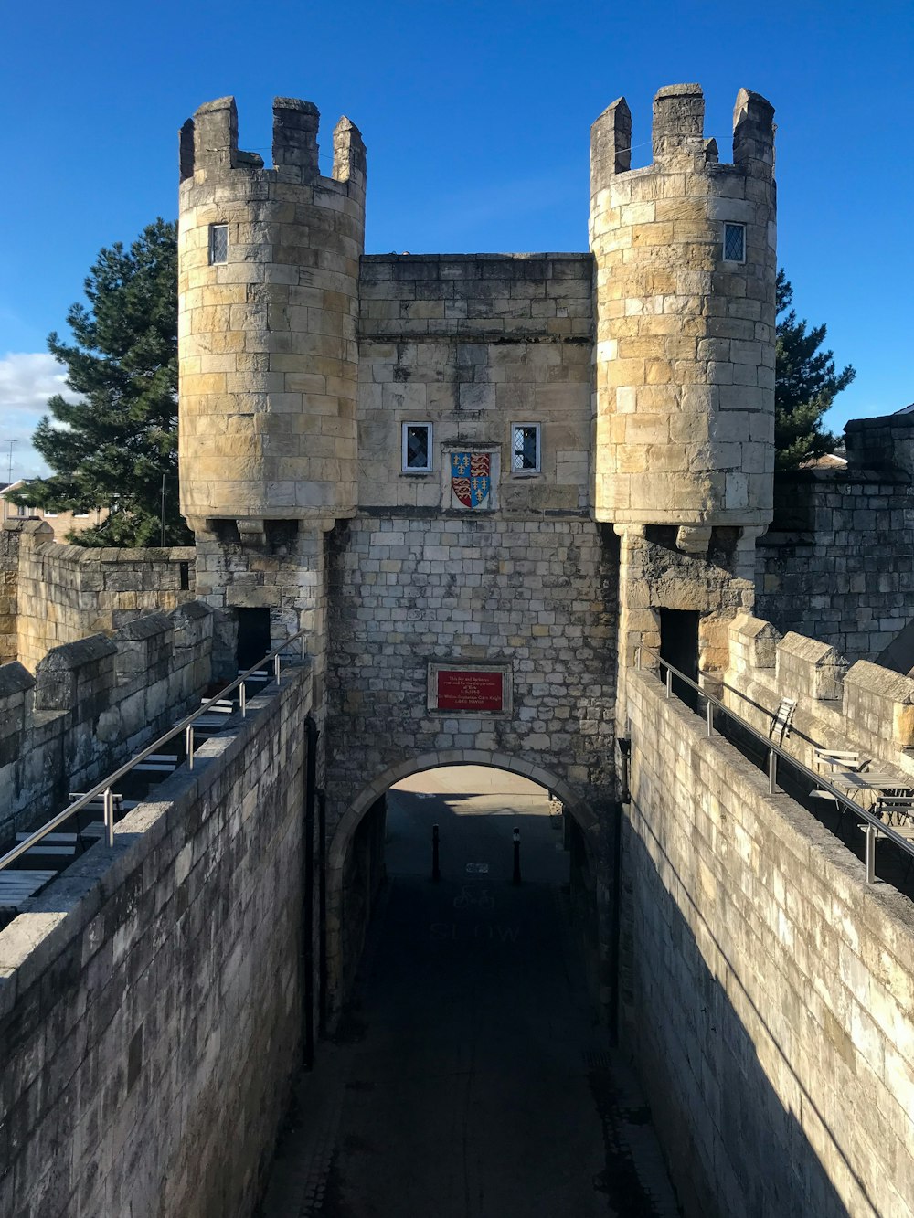 a large stone castle with two towers on top of it