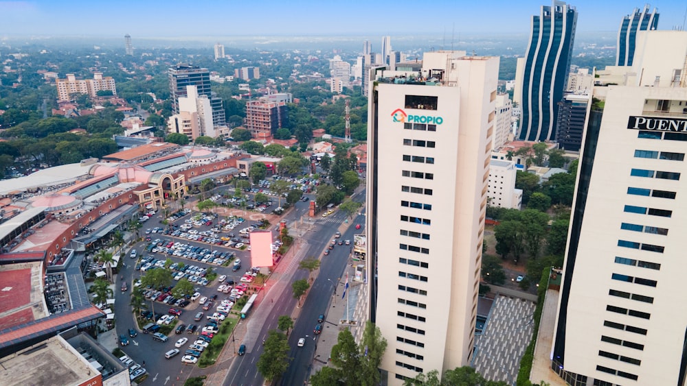 an aerial view of a city with tall buildings