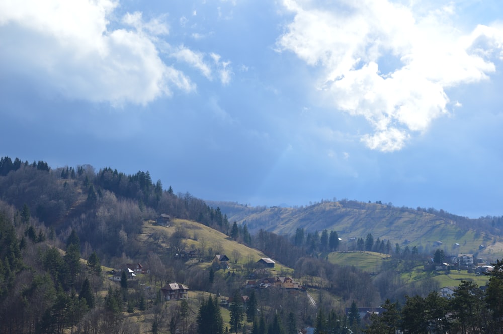 a view of a mountain with houses on it