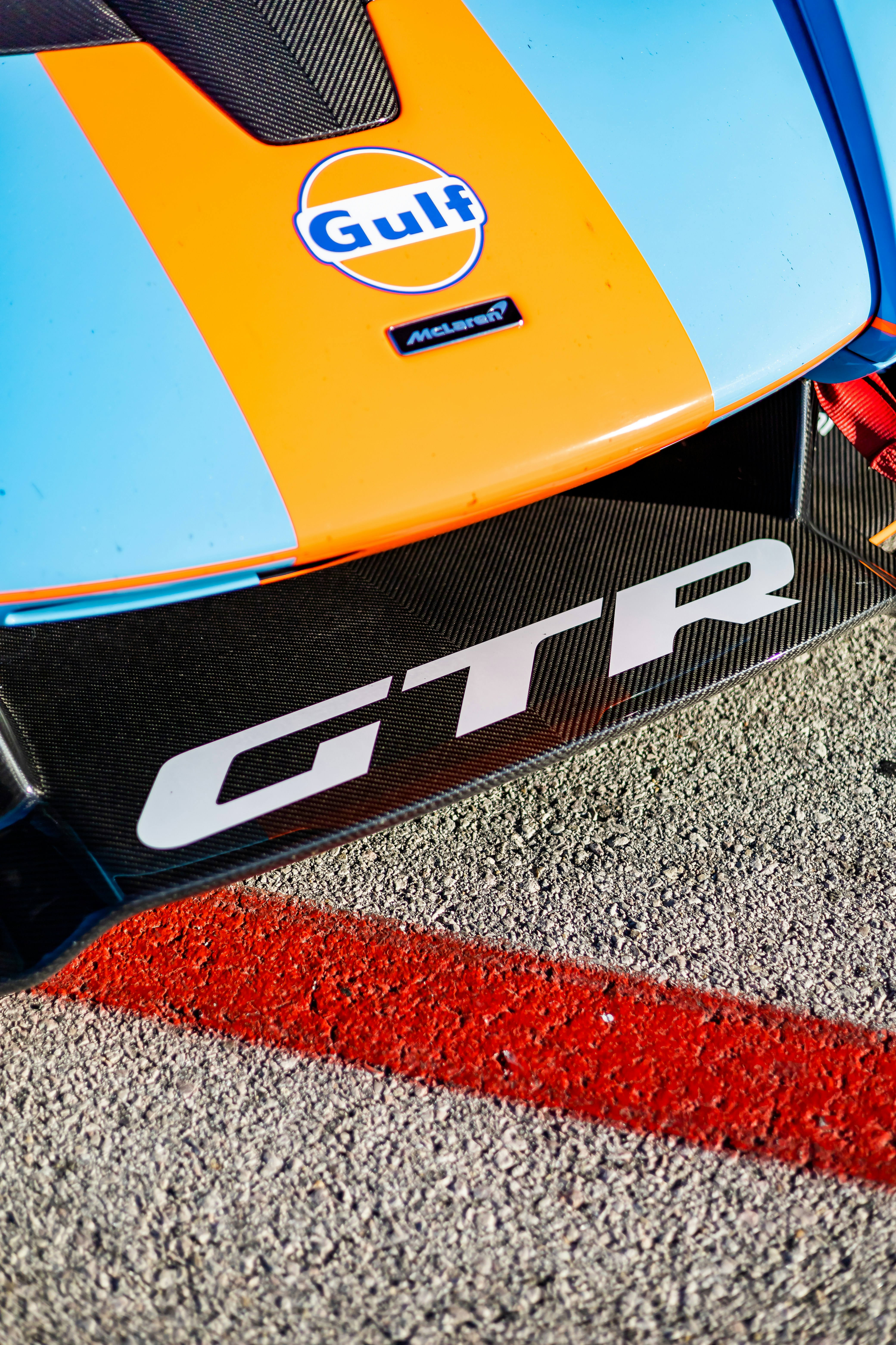 A close up of the front end of a race car photo – Free Bumper Image on ...