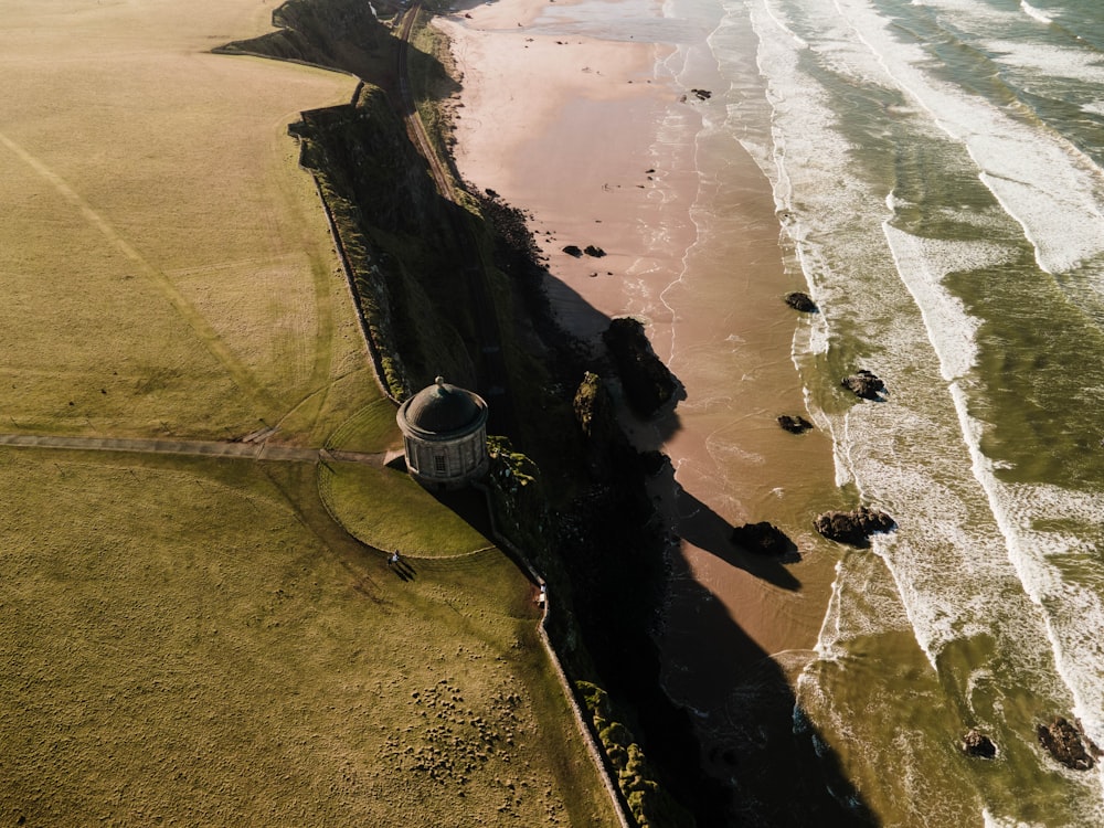 an aerial view of a beach and the ocean