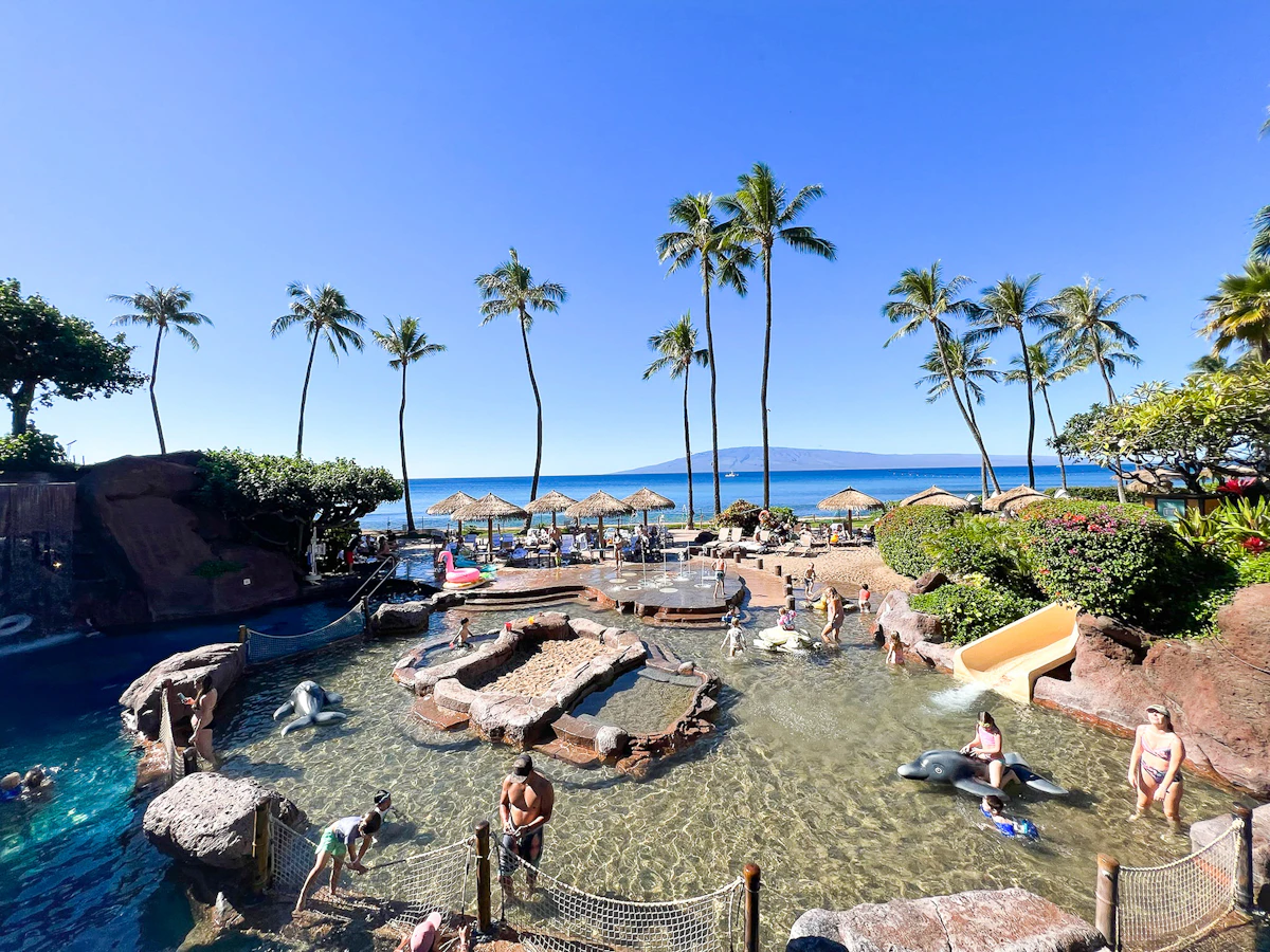 Children playing in a resort swimming pool