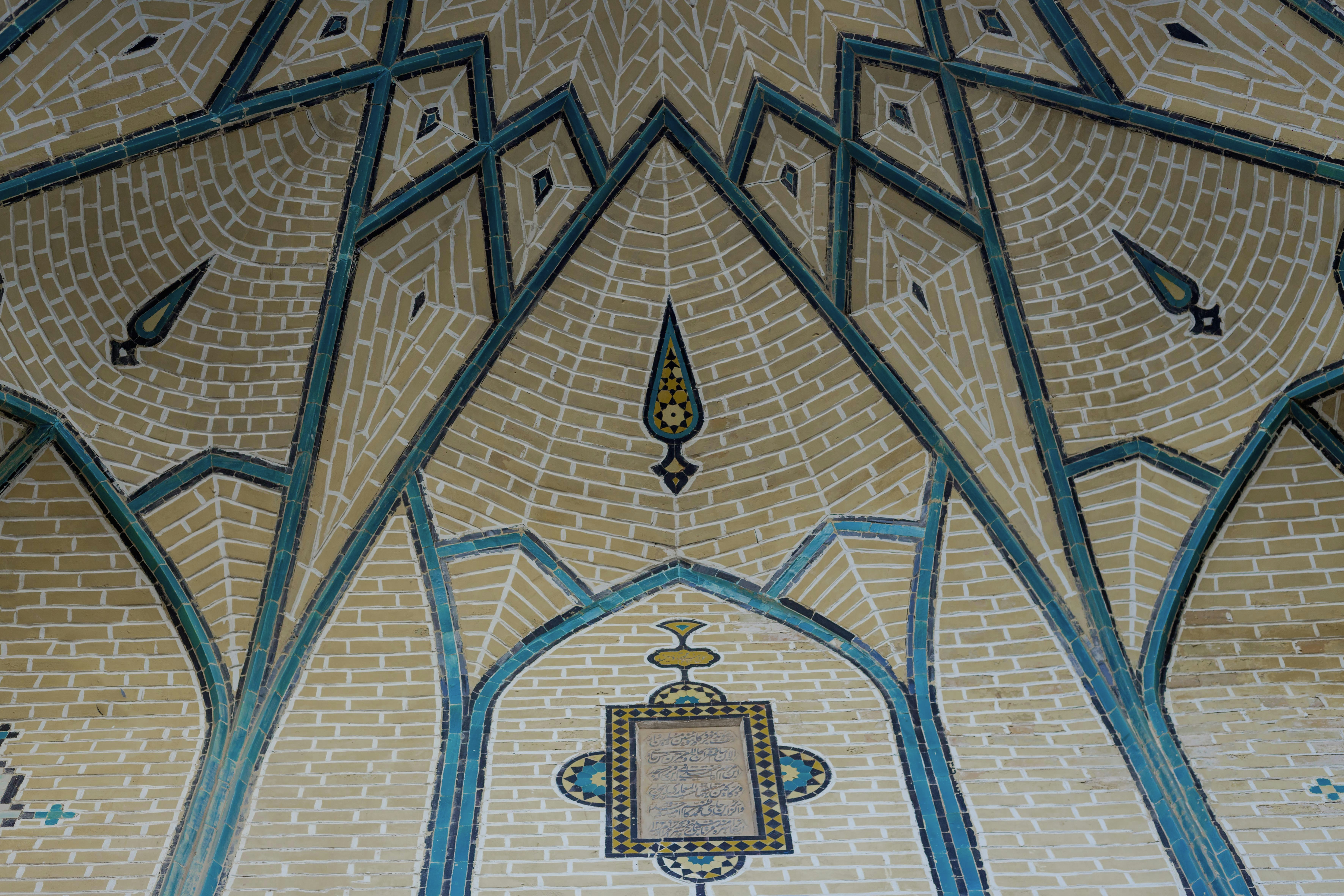 a clock sitting on the side of a building, 