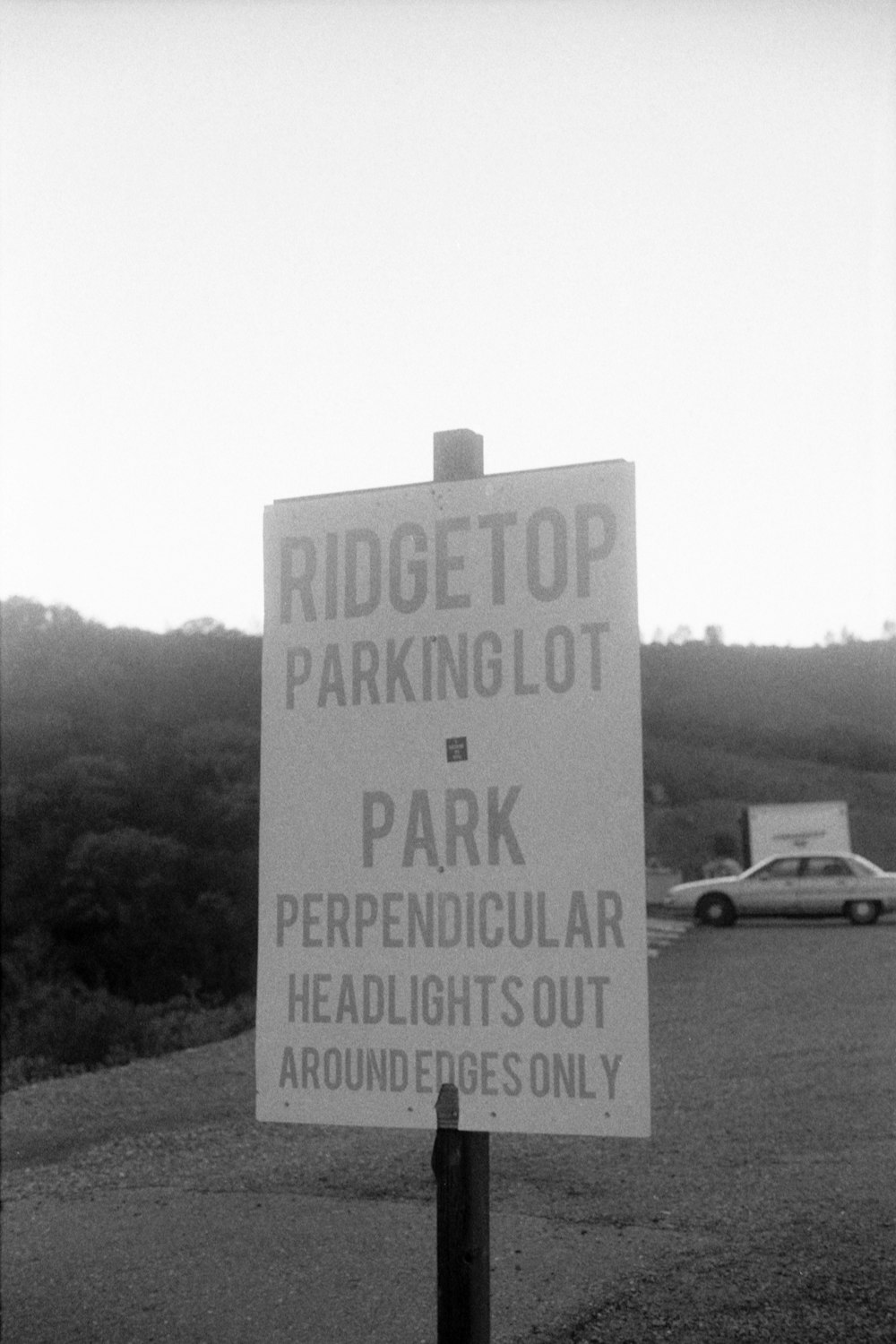 a sign on the side of a road