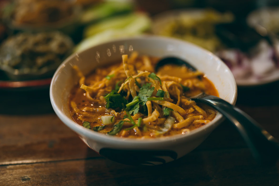 A steaming bowl of Khao Soi Curry Noodles