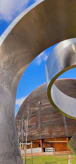 a large metal structure with writing on it
