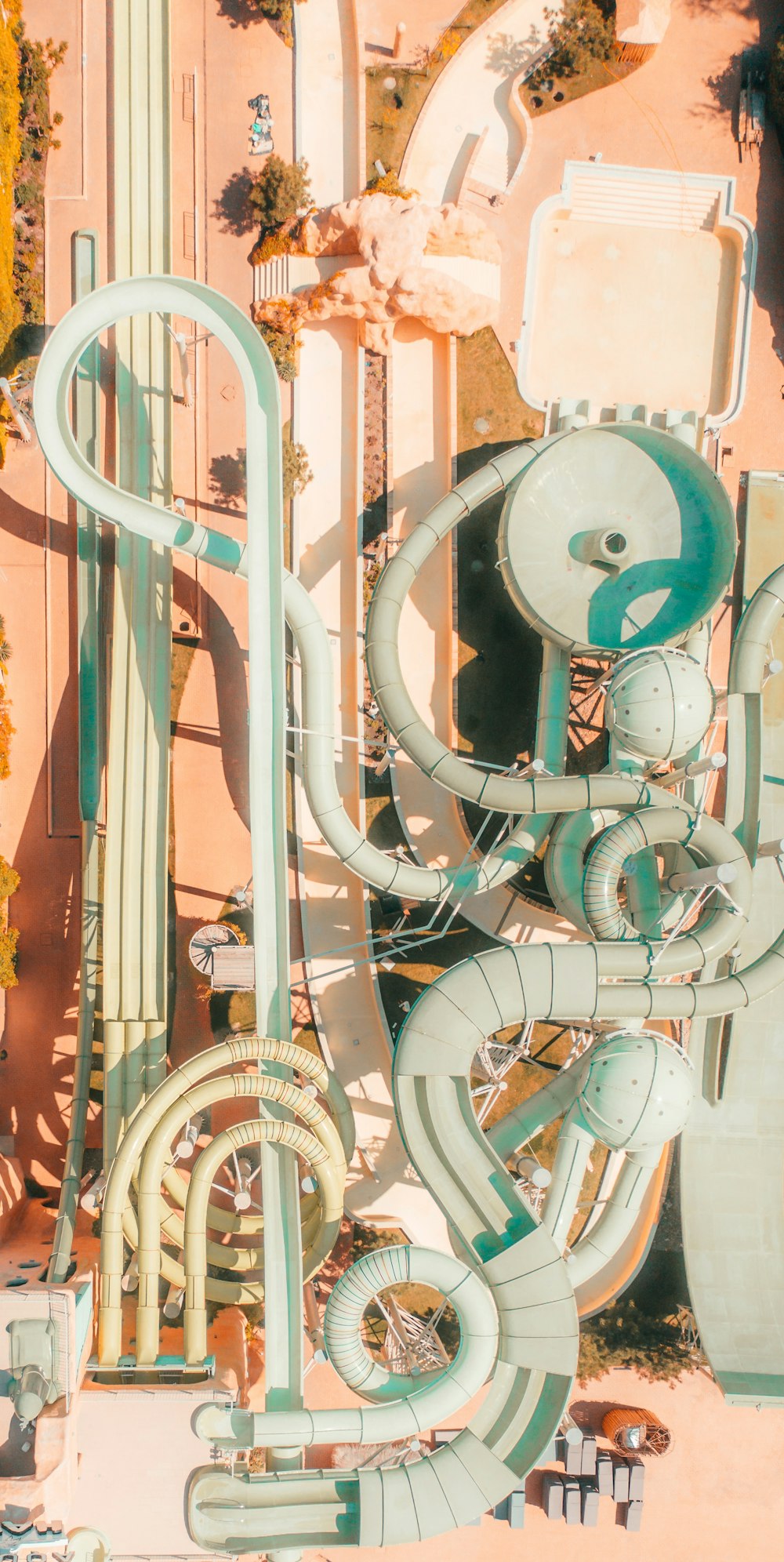 an aerial view of a city with a lot of pipes