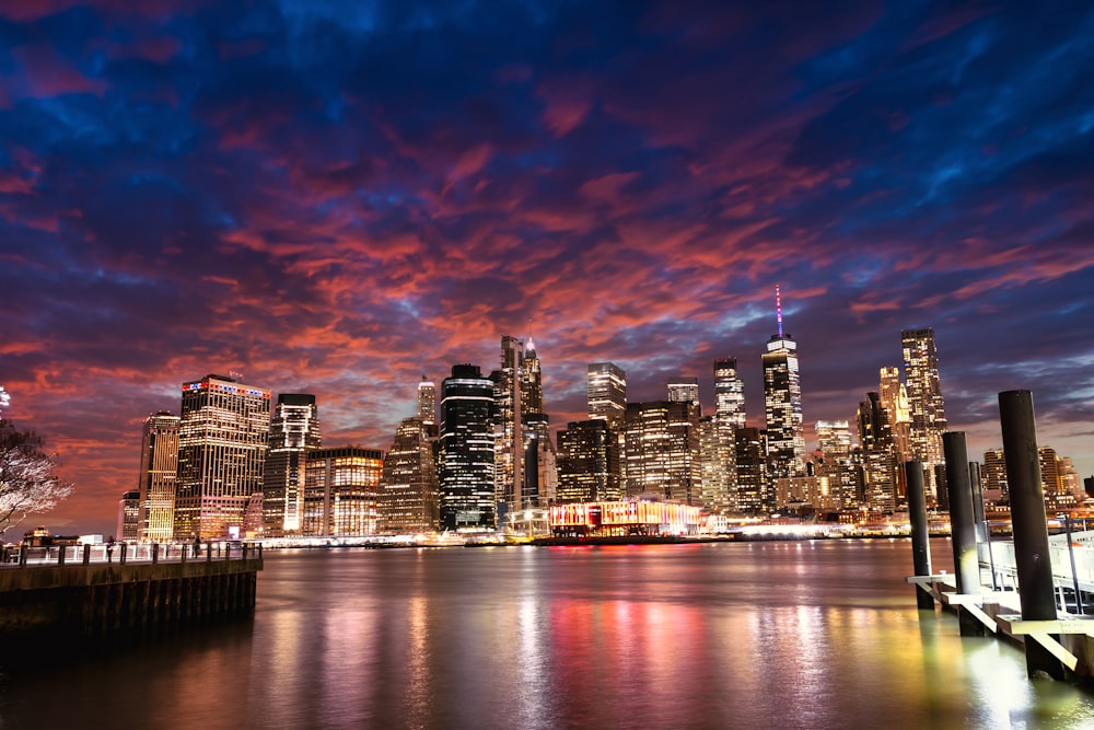 a view of a city at night from the water