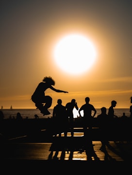 a person jumping a skate board in the air