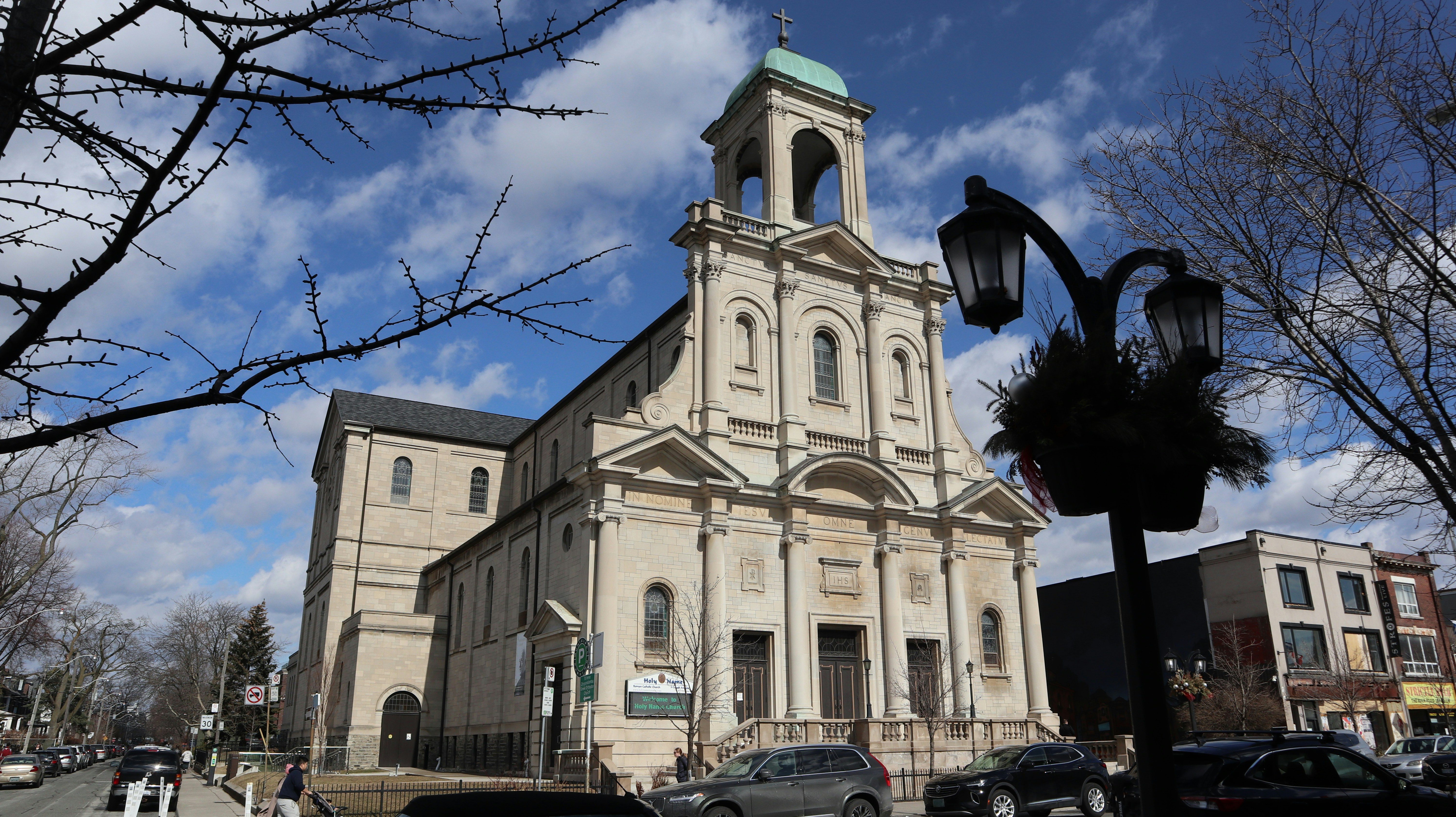 a large church with a steeple and a clock tower