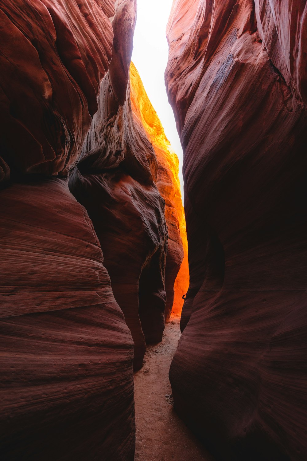 a narrow slot in the side of a mountain