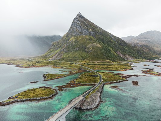 An aerial view of a bridge over a body of water — Lofoten, Norway