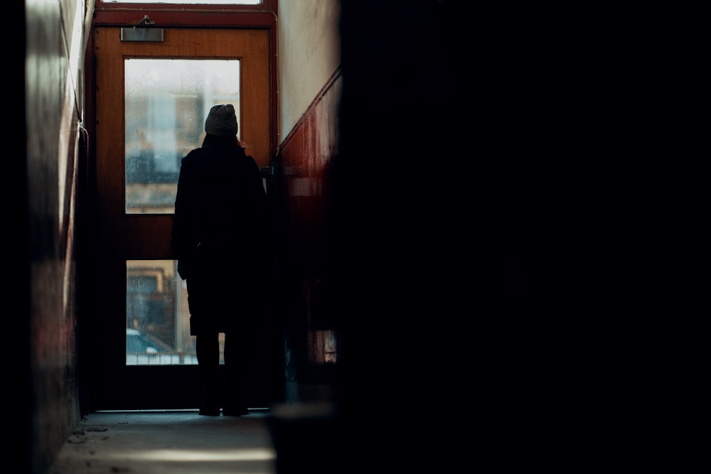 a person standing in front of a door