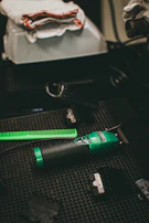 Close-up of a cordless hair trimmer highlighting its ergonomic grip and silver finish.