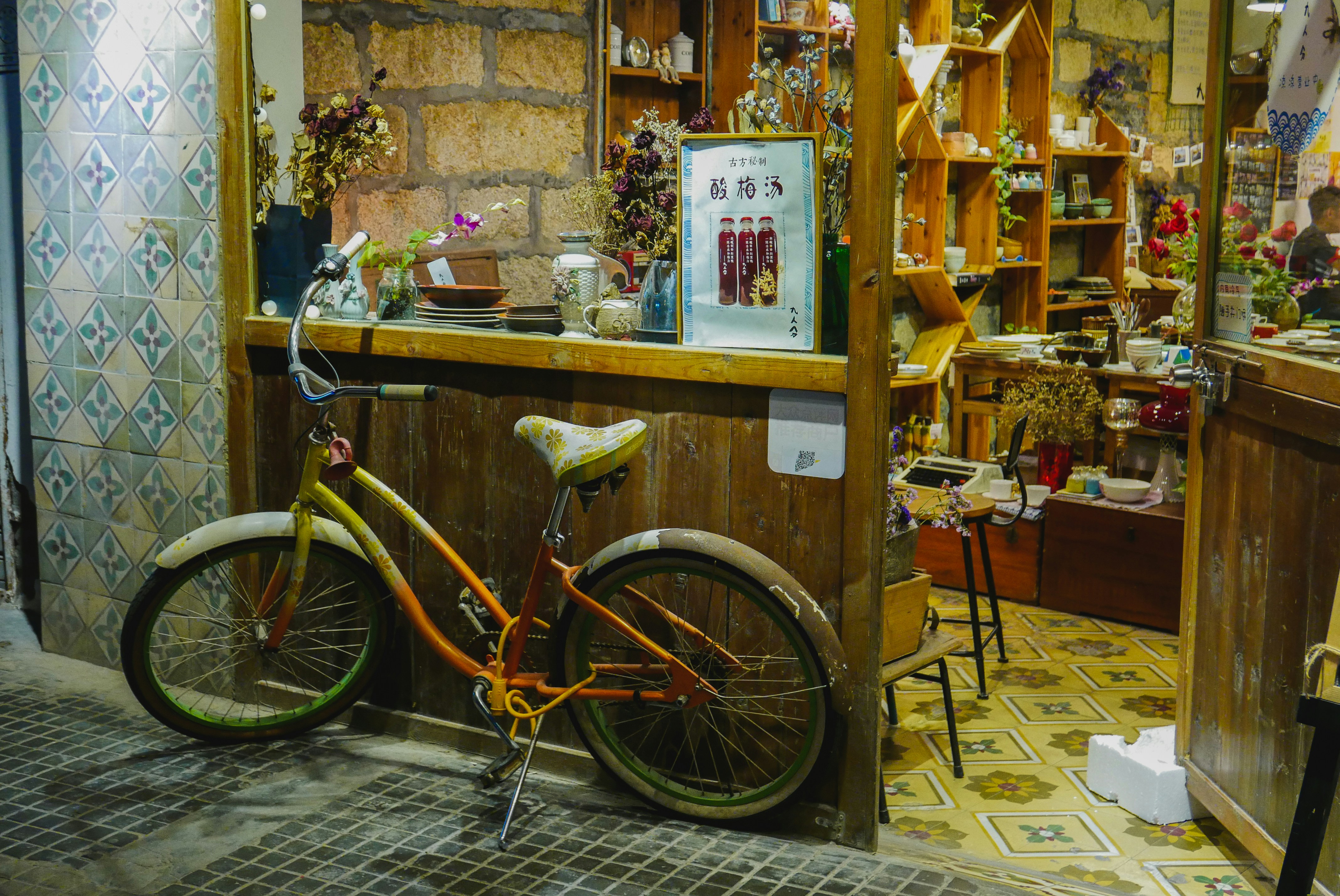 a bicycle is parked in front of a store