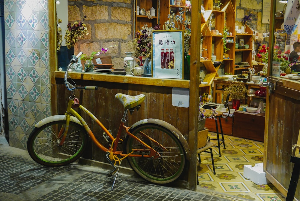 a bicycle is parked in front of a store