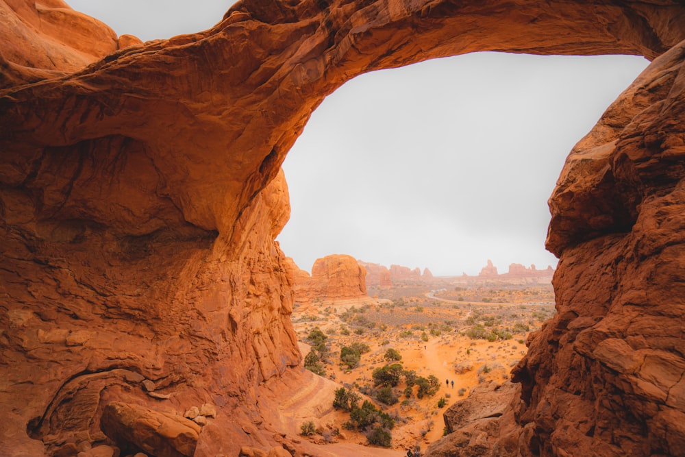 a large rock formation with a hole in the middle