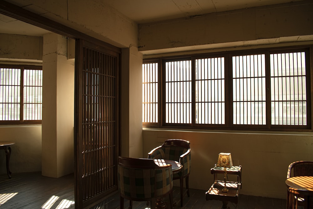 a room with two chairs and a table in it