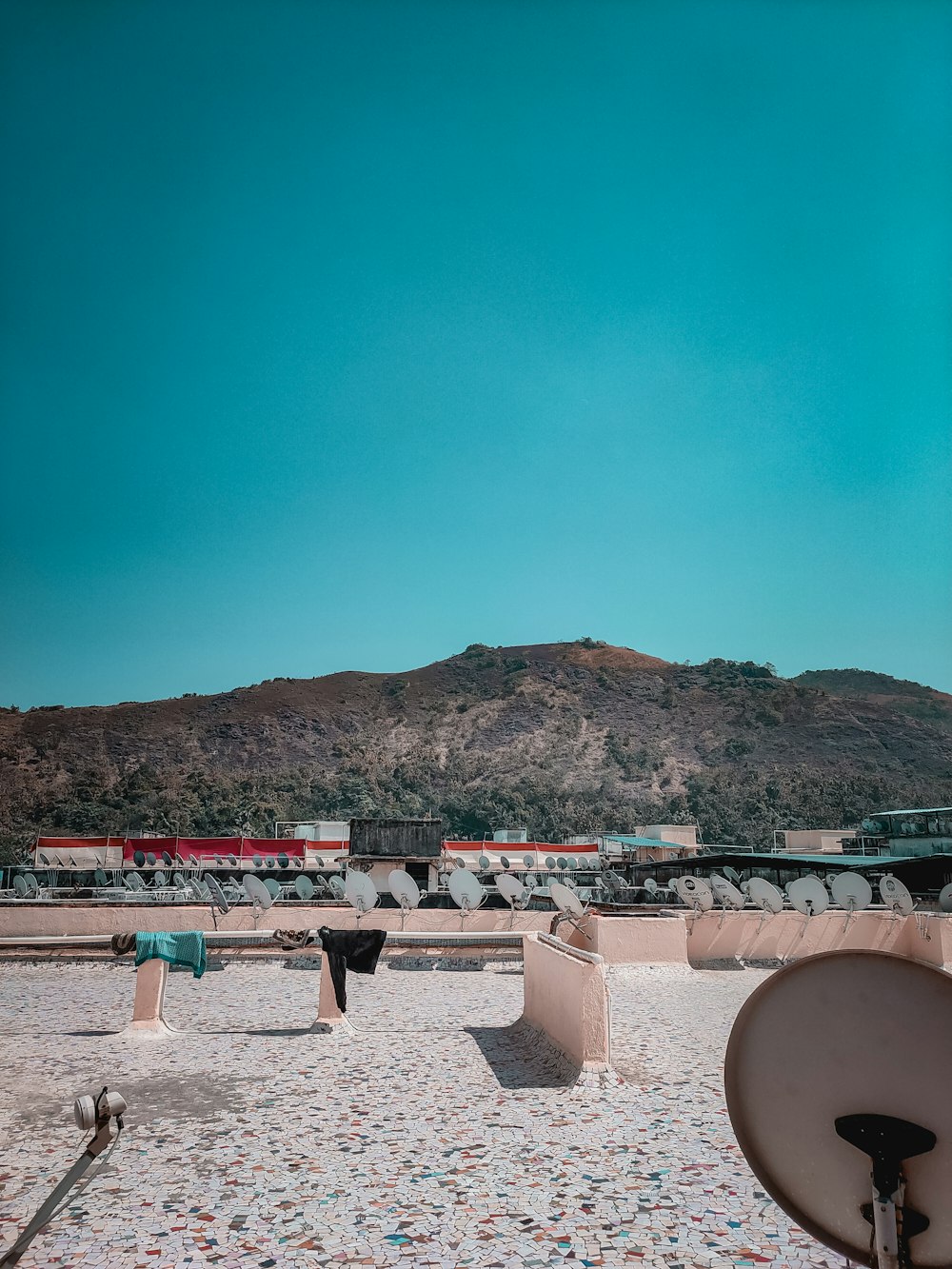 a view of a beach with a mountain in the background