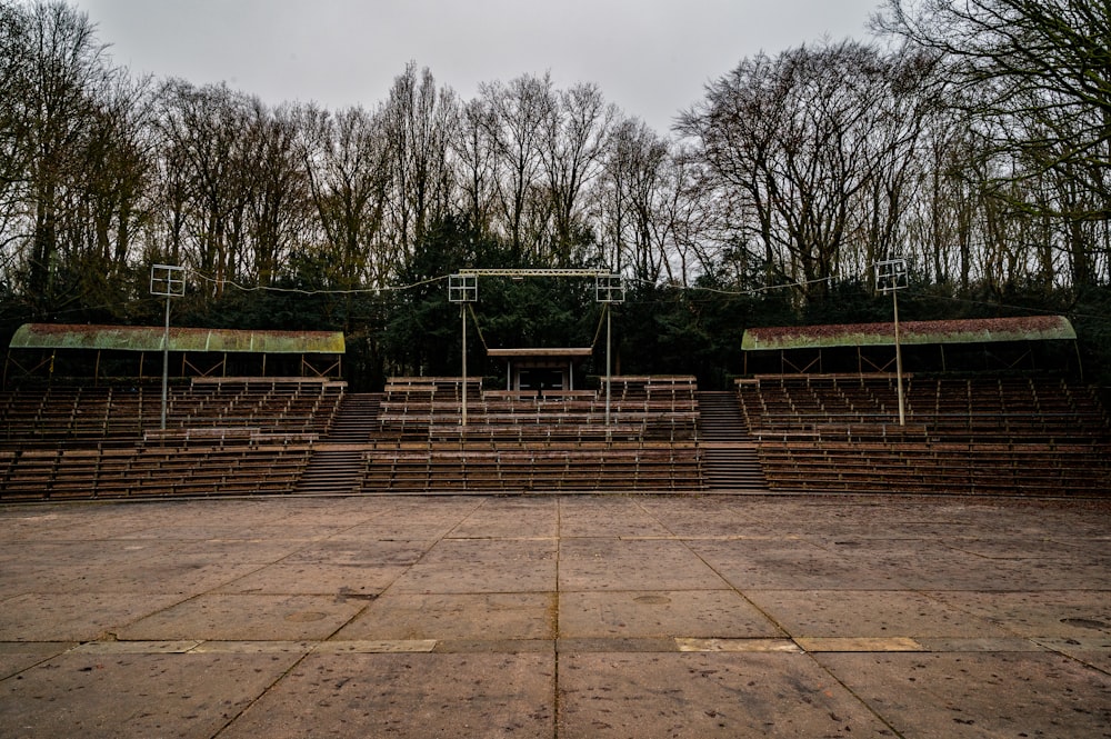 a set of empty seats in an outdoor theater