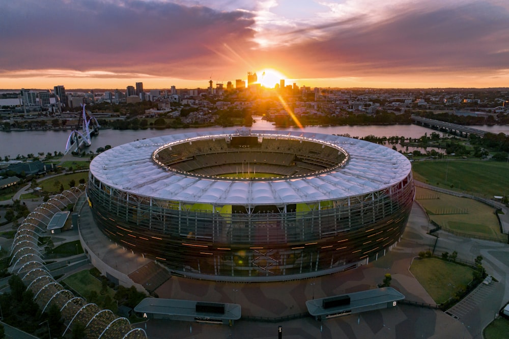 an aerial view of a soccer stadium at sunset