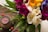 A vibrant bouquet of flowers displayed at a birthday celebration.