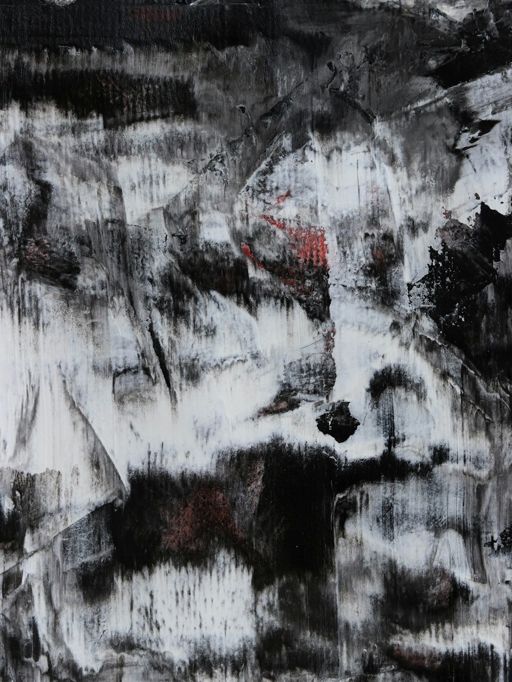 an abstract painting with black and white colors