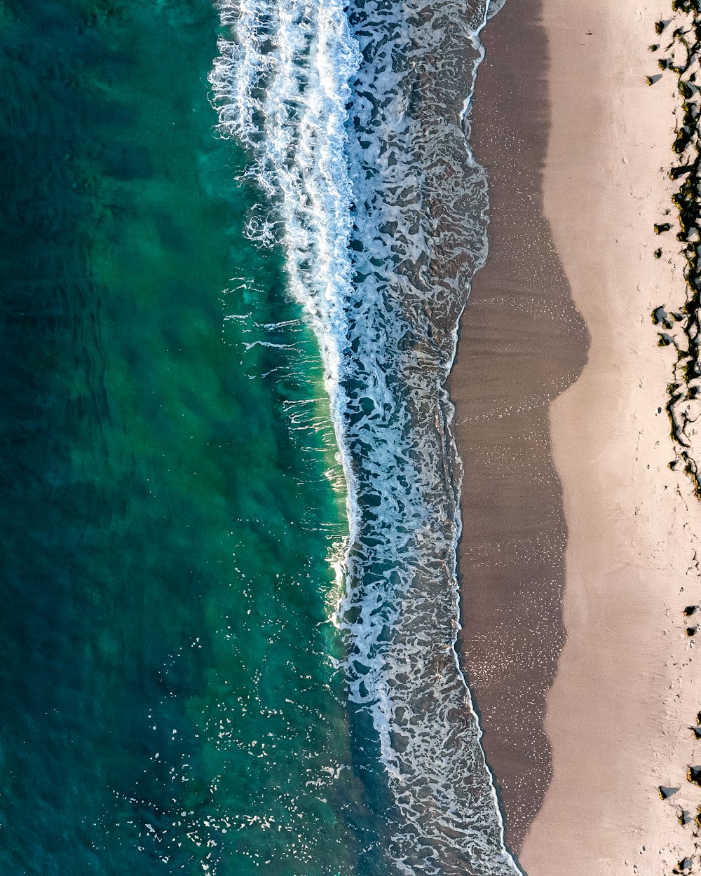 an aerial view of a beach and ocean